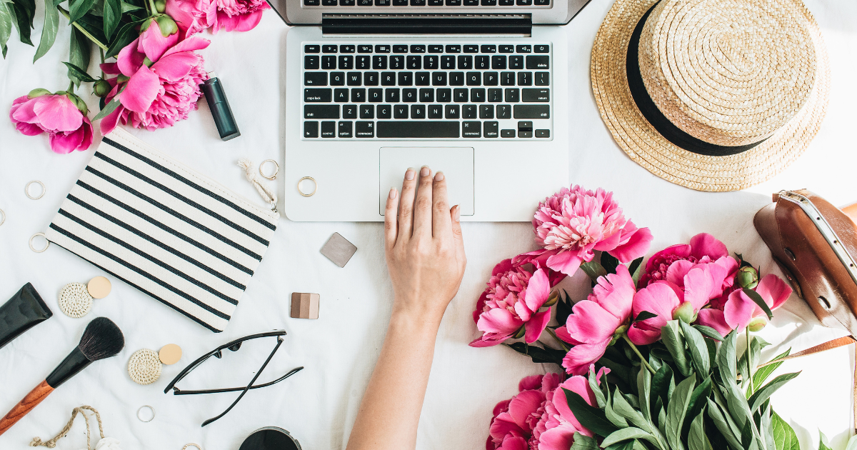 Overhead of woman typing home office