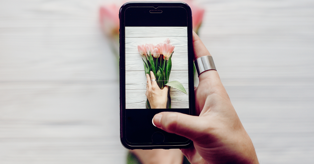 Woman taking iPhone picture for nstagram